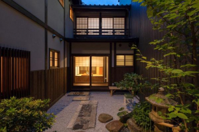 Отель Garaku an Machiya House  Киото
